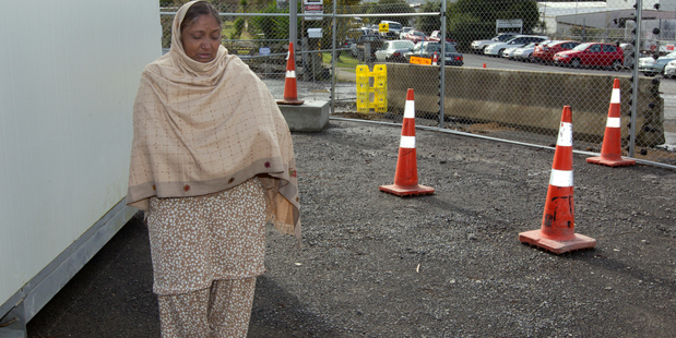 Karamjit Kaur, whose son Charanpreet Singh Dhaliwal, was killed on his first shift as a security guard in West Auckland on November 18, 2011, visits the site for the first time. Photo / Brett Phibbs