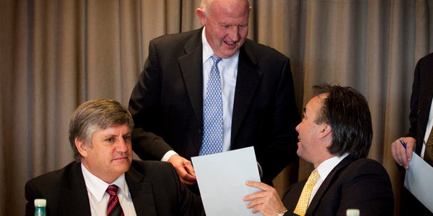 Metlifecare chief executive Alan Edwards (left), independent director Brent Harman (standing) and chairman Peter Brown. Photo / Natalie Slade
