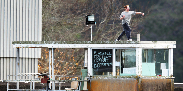 Aaron Forden throws objects off the tower. Photo / Doug Sherring