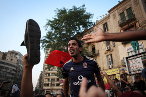 Protesters chant slogans against the military ruling council after judges ruled that Mubarak's former prime minister can stand in the presidential runoff. Photo / Manu Brabo