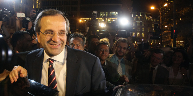 Leader of the Greek New Democracy conservative party Antonis Samaras. The New Zealand dollar may rise after the party won enough seats to form a majority government. Photo / AP