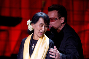 Aung San Suu Kyi with Bono after accepting her Ambassador of Conscience Award. Photo / AP
