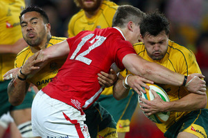 Wales' Scott Williams, center, wraps up Australia's Adam Ashley-Cooper, right, and Digby Ioane. Photo / AP.