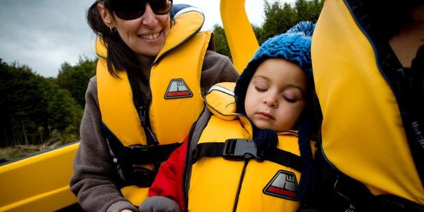Jet boating around Lake Manapouri left tot Caleb Purcell super-relaxed. Photo / Dean Purcell
