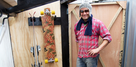 Justin Newcombe with his storage rack. Photo / Steven McNicholl