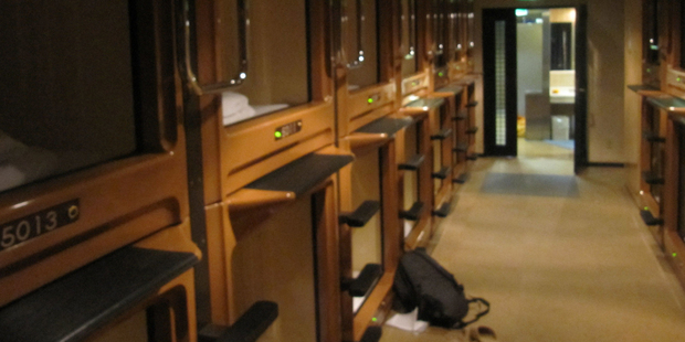 Tokyo's capsule hotels are mostly used by workers who miss the last train home. To get a good night's sleep you may need earplugs to block out the noises coming from other capsules. Photo / Nicholas Jones