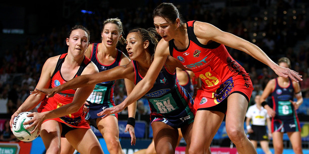 Khao Watts (left) and Irene van Dyk (right) of the Magic in action. Photo / Getty Images