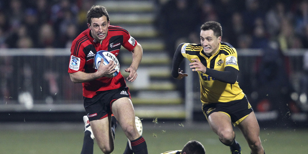 Tom Taylor of the Crusaders in action against the Hurricanes at AMI Stadium, Christchurch, last night. The Canes were slender victors. Photo / Getty Images