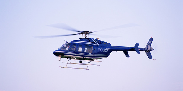 Tactical response officers, dogs and a helicopter equipped with a thermal imaging system are on the hunt for the killer in the Berry Springs area south of Darwin. File photo / Thinkstock