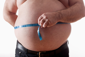Depression has now been linked to excessive belly fat, scientists have found. Photo / Thinkstock