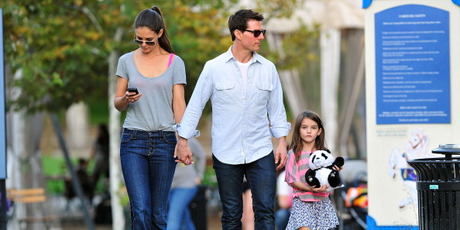 Katie Holmes and Tom Cruise, seen here with daughter Suri, are divorcing. Photo / AP