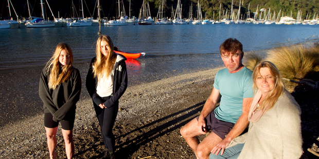 Dougal and Michelle Burfoot with their daughters Jacqui (17) and Megan (15) at Stillwater peninsula. Photo / Natalie Slade