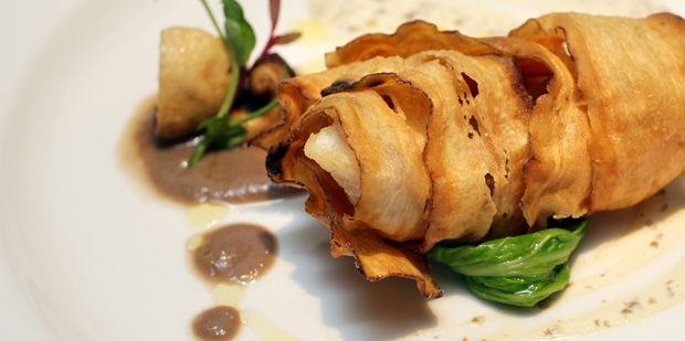 Kazuya's snapper comes wrapped in ribbons of oven-crisp burdock. Photo / Doug Sherring