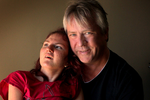 Stephen Carter with Paige, who was born with cerebral palsy. Photo / Alan Gibson