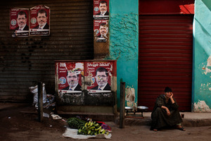 History has gone into reverse as military governments clamber back into the saddle or slaughter their people. Photo / AP
