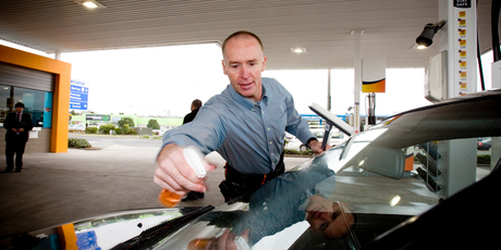 CEO Mike Bennetts helps with service on a Z forecourt. Photo / Dean Purcell