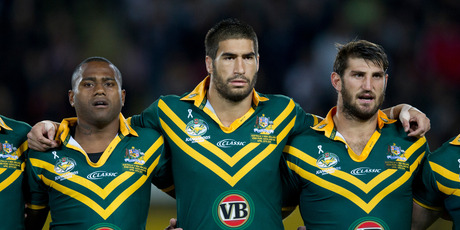 Australia's and ex-Junior Kiwi James Tamou flanked by Akuila Uate and Davis Taylor during the Australian nation anthem, during the rugby league ANZAC test match between the Kiwis and Kangaroos. Photo / Brett Phibbs.