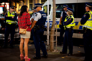 The Kiwi drinking culture in full glory as people party on Auckland city's main street, Queen Street. Photo / Dean Purcell