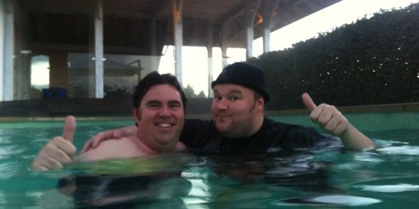 Kim Dotcom (r) pictured with Ben Gracewood during the pool party at the Dotcom mansion organised through twitter this week. Photo / supplied