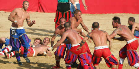 Every year, 54 men strip off their shirts and prepare to be pounded in the football game of Calcio Storico in Florence. Photo / Creative Commons image by Wikimedia user Lorenzo Noccioli