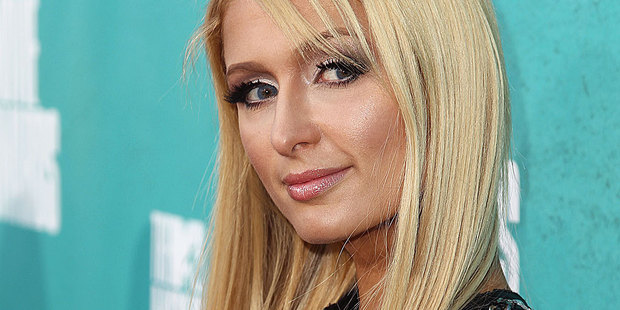 Paris Hilton has made her DJ debut, premiering a new single during a show at the Pop Music Festival in Brazil. Photo / AP