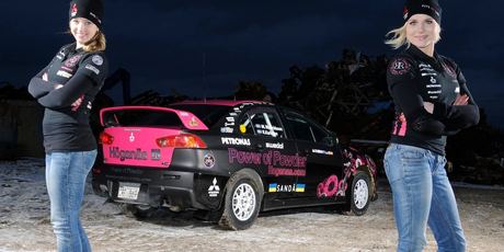 Ramona Karlsson and co-driver Miriam Walfridsson with the Mitsubishi that burnt during Rally New Zealand yesterday.