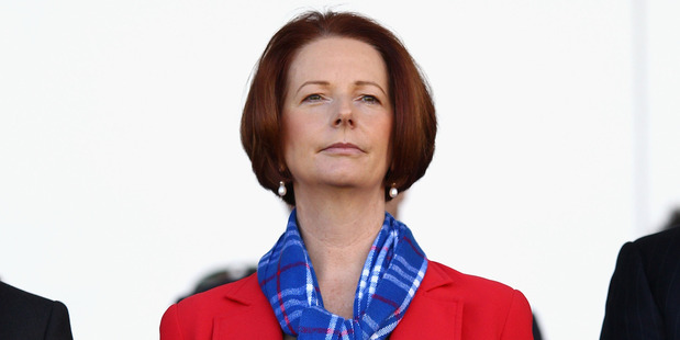 Australian PM Julia Gillard spent much of yesterday rebuffing Tony Abbott's claims. Photo / Getty Images