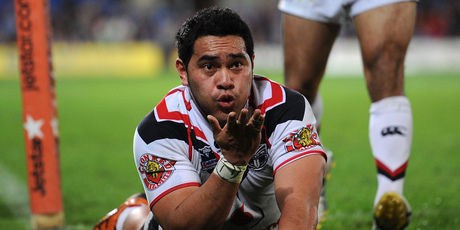 Konrad Hurrell of the Warriors celebrates scoring a try. Photo / Getty Images