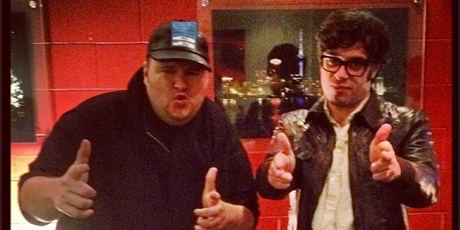 Megaupload founder Kim Dotcom shares a backstage moment with Jemaine Clement after the Flight of the Conchords show. Photo / Supplied