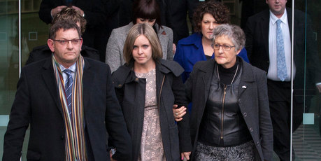 Bryan Guy, with his daughter Anna MacDonald and wife Joanne Guy walk from the High Court in Wellington  after Ewen MacDonald was found not guilty of the murder of Scott Guy. Photo / Guy Bowker