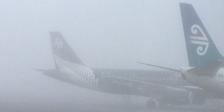 Planes stranded by fog at the domestic terminal Auckland Airport. Photo / Sarah Ivey