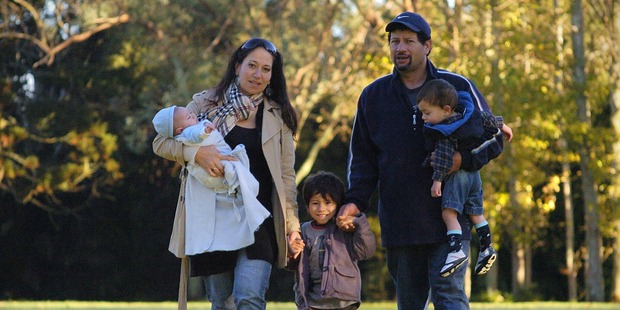 Carol and Darren Povey with Mokena Paikea, 2 months, Asha, 4, and Paikea's twin brother Franklyn, 20 months. Photo / Jason Dorday