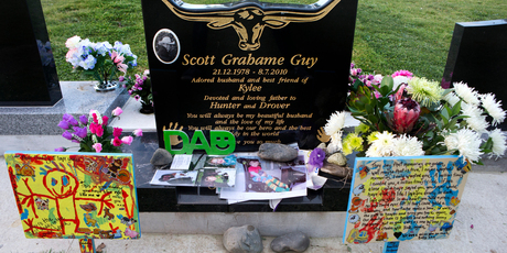 Messages on Scott Guy's grave in Feilding from Kylee Guy and their sons, Hunter and Drover. Photo / Herald on Sunday