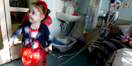 Madison Merrick, aged 2, who has had serious infections from her intravenous feeding lines, says: 'My tummy gets sore lots'. Photo / Dean Purcell