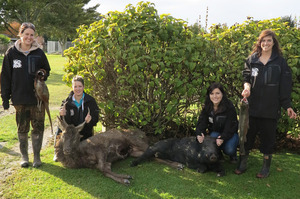 Paula Roberts, left, Rachael Blackie, Bryar Bakalich and Stacey Rust with their pheasant, stag, boar and trout.
Photo / Supplied