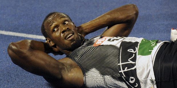 Usain Bolt was having hamstring trouble in Jamaica this week. Picture / AP.