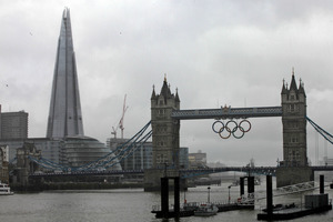 A view of the iconic Tower Bridge, right, over the river Thames, right, and The Shard, left, a newly-constructed high-rise building that is western Europe's tallest, in London. Photo / AP