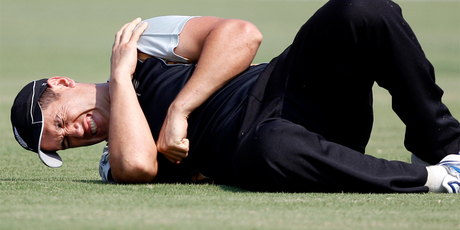 New Zealand Ross Taylor grimaces after diving for a ball hit by West Indies Kieron Pollard during a Twenty20 cricket match. Photo / AP