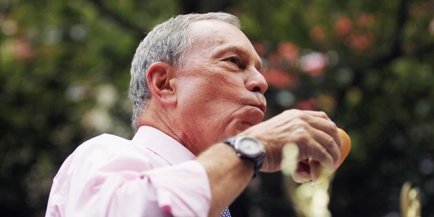 The puns were terrible, but at least the hot dogs were good. Michael Bloomberg, New York mayor, at the Nathan's Hot Dog Eating Contest. Photo / AFP