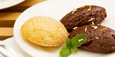 Chocolate marsala mousse with gold leaf madeleines. Photo / Babiche Martens