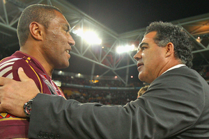 Petero Civoniceva of the Maroons is congratulated by coach Mal Meninga. Photo / Getty Images