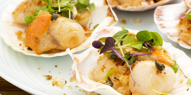 Seared scallops, micro greens and caper breadcrumbs. Photo / Babiche Martens