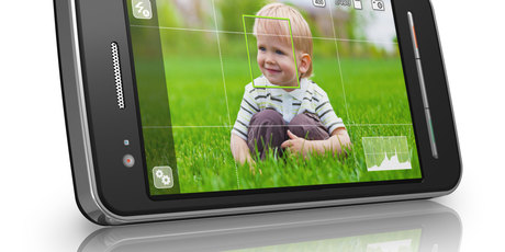 Smartphones are good for taking pictures of the children, but do they take up valuable family time? Photo / Thinkstock