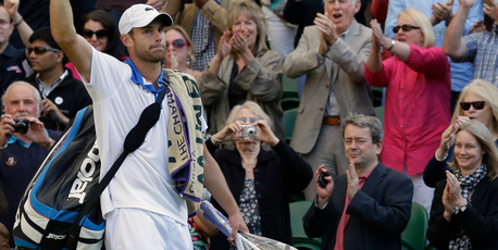 Andy Roddick of the United States gestures to the crowd after losing to David Ferrer of Spain at Wimbledon. Photo / AP
