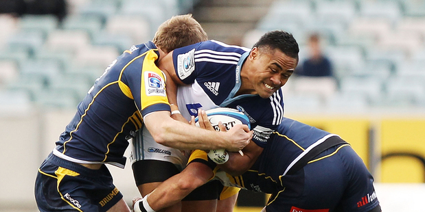 Francis Saili of the Blues is tackled during the Super Rugby Round 18 game between the Brumbies and the Blues. Photo / Getty Images.