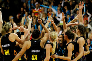 The Magic team celebrate after winning. Photo / Christine Cornege