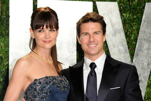 Katie Holmes and Tom Cruise who are calling it quits after five years are keeping the details of their divorce quiet. File Photo / AP