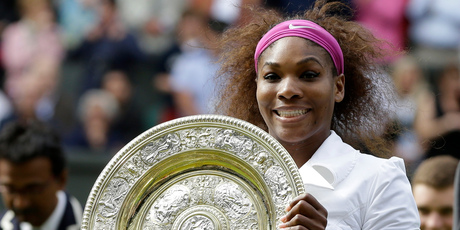 Serena Williams with the trophy after defeating Agnieszka Radwanska of Poland to win the women's final match at the All England Lawn Tennis Championships at Wimbledon. Photo / AP