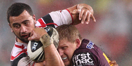 Ben Matulino of the Warriors is tackled during the NRL Round 19 game between the Brisbane Broncos and the New Zealand Warriors. Photo / Getty Images.