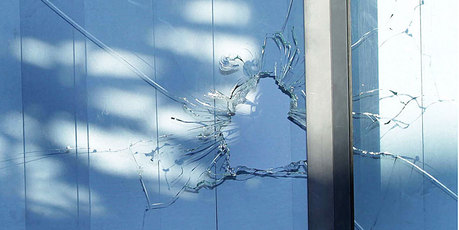A close-up view of a bullet hole in a ranchslider window after a shot was fired into a house in the Tauranga suburb of Welcome Bay. Photo / Alan Gibson